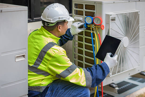 Professional Hvac technician working in Elwood, NJ